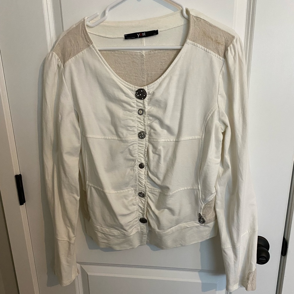 Yest jacket with decorative buttons